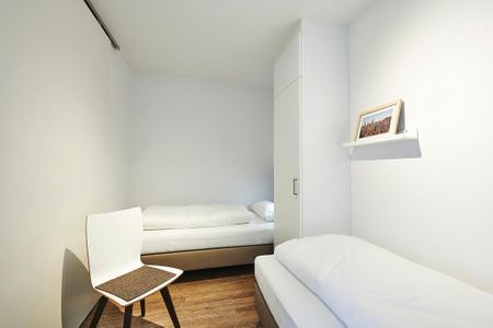 Deichhäuser Anna Küste Deichhäuser Anna Küste 3-21 Bensersiel - Schlafzimmer mit zwei Einzelbetten