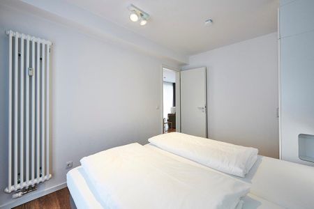 Deichhäuser Anna Küste Deichhäuser Anna Küste 3-23 Bensersiel - Schlafzimmer mit Doppelbett