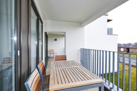 Deichhäuser Anna Küste Deichhäuser Anna Küste 3-23 Bensersiel - Balkon mit Gartenmöbel