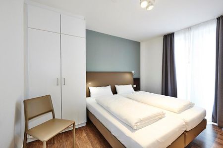 Deichhäuser Anna Küste Deichhäuser Anna Küste 3-33 Bensersiel - Schlafzimmer mit Doppelbett