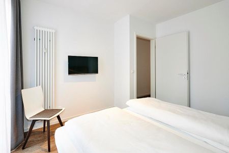 Deichhäuser Anna Küste Deichhäuser Anna Küste 4-10 Bensersiel - Schlafzimmer mit Doppelbett