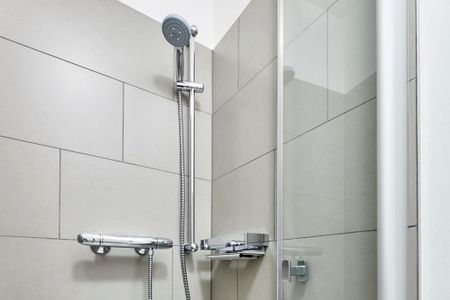Deichhäuser Anna Küste Deichhäuser Anna Küste 3-23 Bensersiel - Badezimmer mit Dusche