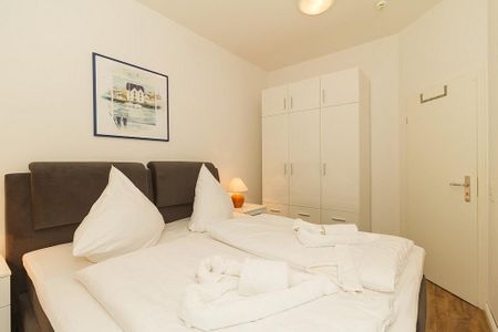 Meeresblick Meeresblick 008 Kühlungsborn - Schlafzimmer mit Doppelbett und Kleiderschrank