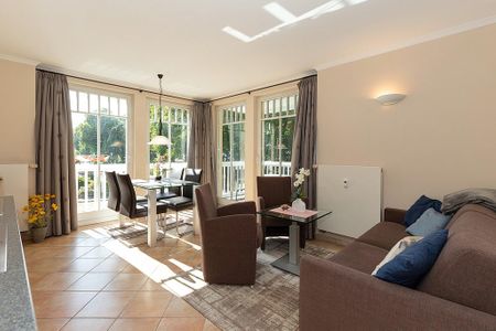Dünenschloss Dünenschloss 2-12 Kühlungsborn - Wohn-Essbereich mit Couch