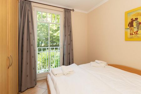 Dünenschloss Dünenschloss 2-12 Kühlungsborn - Schlafzimmer mit Doppelbett