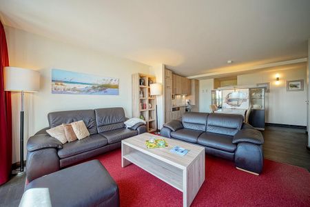 Resort Deichgraf Resort Deichgraf 27-21 Wremen - Wohn-Essbereich mit Couch
