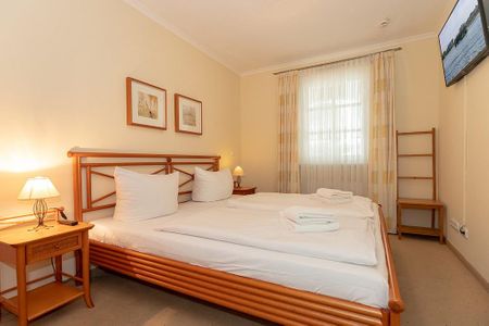 Apartmenthaus Atlantik Apartmenthaus Atlantik 116 Kühlungsborn - Schlafzimmer mit Doppelbett