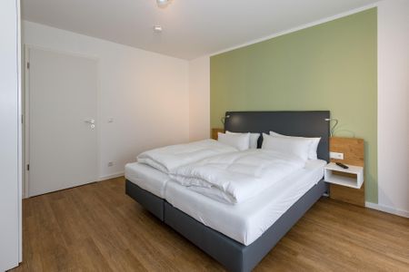 Deichhäuser Anna Küste Deichhäuser Anna Küste 6-11 Bensersiel - Schlafzimmer mit Doppelbett
