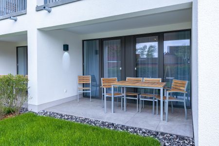 Deichhäuser Anna Küste Deichhäuser Anna Küste 6-11 Bensersiel - Terrasse mit Sitzgelegenheiten