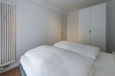 Deichhäuser Anna Küste Deichhäuser Anna Küste 6-13 Bensersiel - Schlafzimmer mit Doppelbett