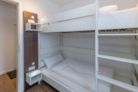Deichhäuser Anna Küste Deichhäuser Anna Küste 6-20 Bensersiel - Schlafzimmer mit Etagenbett