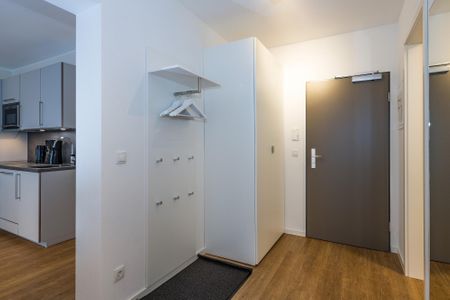 Deichhäuser Anna Küste Deichhäuser Anna Küste 6-21 Bensersiel - Flur mit Garderobe
