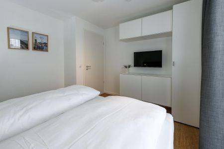 Deichhäuser Anna Küste Deichhäuser Anna Küste 6-30 Bensersiel - Schlafzimmer mit Doppelbett