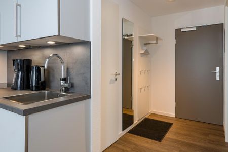 Deichhäuser Anna Küste Deichhäuser Anna Küste 6-34 Bensersiel - Flur mit Garderobe und Spiegel