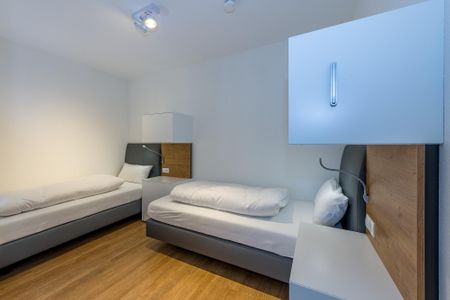 Deichhäuser Anna Küste Deichhäuser Anna Küste 7-11 Bensersiel - Schlafzimmer mit zwei Einzelbetten