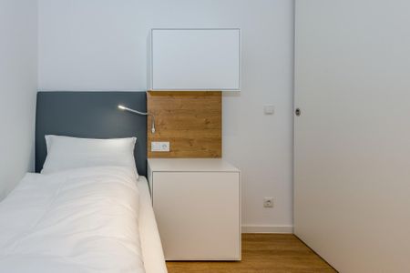 Deichhäuser Anna Küste Deichhäuser Anna Küste 7-11 Bensersiel - Schlafzimmer mit zwei Einzelbetten