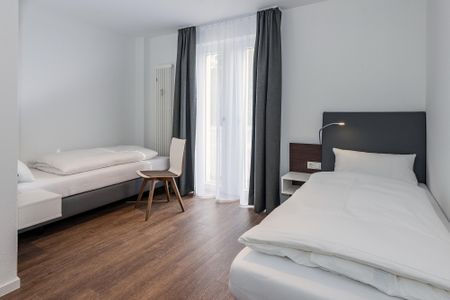 Deichhäuser Anna Küste Deichhäuser Anna Küste 7-14 Bensersiel - Schlafzimmer mit zwei Einzelbetten