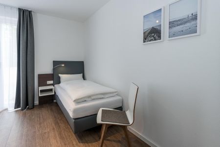 Deichhäuser Anna Küste Deichhäuser Anna Küste 7-14 Bensersiel - Schlafzimmer mit zwei Einzelbetten