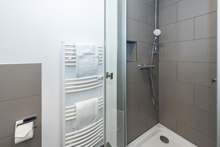 Deichhäuser Anna Küste Deichhäuser Anna Küste 7-22 Bensersiel - Badezimmer mit Dusche