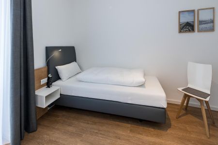 Deichhäuser Anna Küste Deichhäuser Anna Küste 7-24 Bensersiel - Schlafzimmer mit zwei Einzelbetten