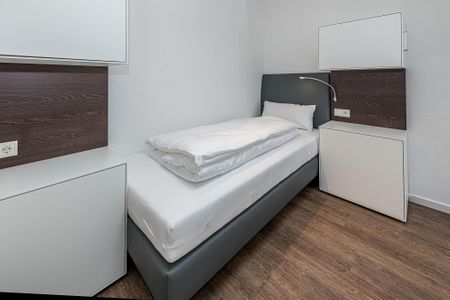 Deichhäuser Anna Küste Deichhäuser Anna Küste 7-31 Bensersiel - Schlafzimmer mit zwei Einzelbetten