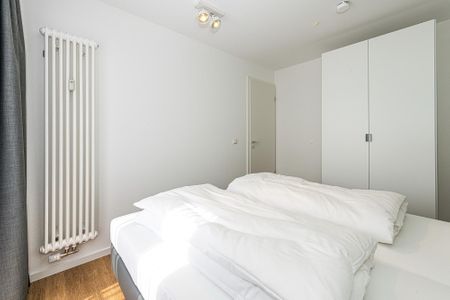 Deichhäuser Anna Küste Deichhäuser Anna Küste 7-33 Bensersiel - Schlafzimmer mit Doppelbett