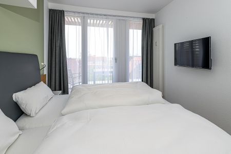 Deichhäuser Anna Küste Deichhäuser Anna Küste 7-33 Bensersiel - Schlafzimmer mit Doppelbett