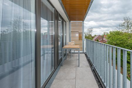 Deichhäuser Anna Küste Deichhäuser Anna Küste 7-33 Bensersiel - Balkon mit Gartenmöbeln