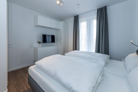 Deichhäuser Anna Küste Deichhäuser Anna Küste 8-10 Bensersiel - Schlafzimmer mit Doppelbett