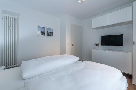 Deichhäuser Anna Küste Deichhäuser Anna Küste 8-10 Bensersiel - Schlafzimmer mit Doppelbett