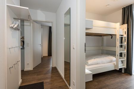 Deichhäuser Anna Küste Deichhäuser Anna Küste 8-10 Bensersiel - Flur mit Zugang zum zweiten Schlafzimmer