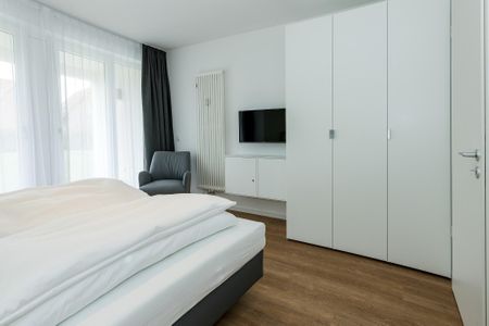 Deichhäuser Anna Küste Deichhäuser Anna Küste 8-11 Bensersiel - Schlafzimmer mit Doppelbett