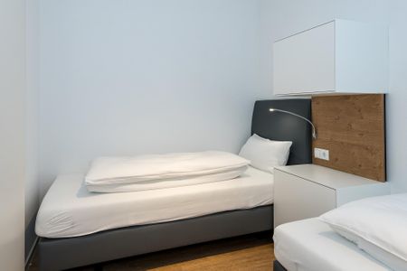 Deichhäuser Anna Küste Deichhäuser Anna Küste 8-11 Bensersiel - Schlafzimmer mit zwei Einzelbetten