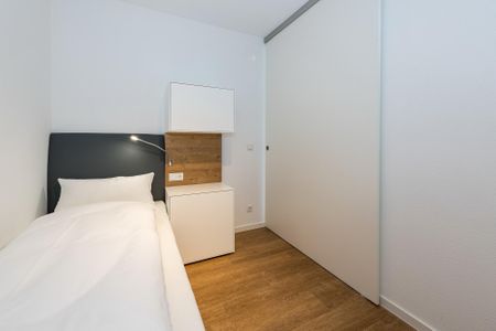 Deichhäuser Anna Küste Deichhäuser Anna Küste 8-11 Bensersiel - Schlafzimmer mit zwei Einzelbetten