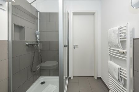 Deichhäuser Anna Küste Deichhäuser Anna Küste 8-13 Bensersiel - Badezimmer mit Dusche
