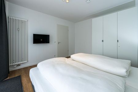 Deichhäuser Anna Küste Deichhäuser Anna Küste 8-14 Bensersiel - Schlafzimmer mit Doppelbett