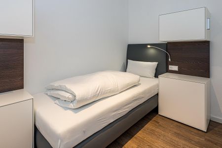Deichhäuser Anna Küste Deichhäuser Anna Küste 8-21 Bensersiel - Schlafzimmer mit zwei Einzelbetten