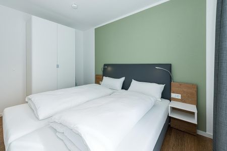 Deichhäuser Anna Küste Deichhäuser Anna Küste 8-23 Bensersiel - Schlafzimmer mit Doppelbett