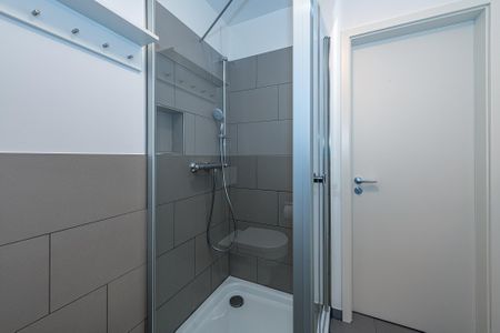 Deichhäuser Anna Küste Deichhäuser Anna Küste 8-23 Bensersiel - Badezimmer mit Dusche