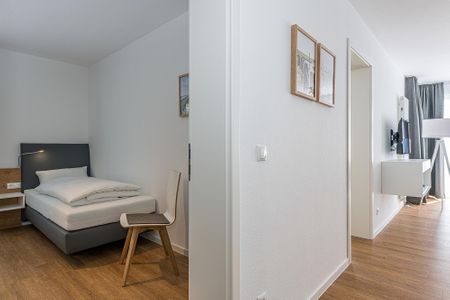 Deichhäuser Anna Küste Deichhäuser Anna Küste 8-24 Bensersiel - Schlafzimmer mit zwei Einzelbetten