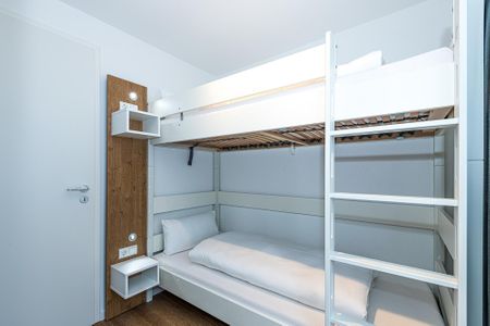 Deichhäuser Anna Küste Deichhäuser Anna Küste 8-30 Bensersiel - Schlafzimmer mit Etagenbett