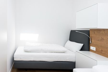 Deichhäuser Anna Küste Deichhäuser Anna Küste 8-31 Bensersiel - Schlafzimmer mit zwei Einzelbetten
