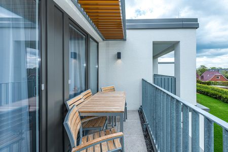 Deichhäuser Anna Küste Deichhäuser Anna Küste 8-31 Bensersiel - Balkon mit Gartenmöbeln