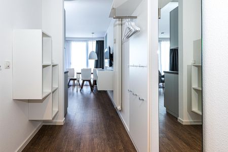 Deichhäuser Anna Küste Deichhäuser Anna Küste 8-33 Bensersiel - Flur mit Garderobe