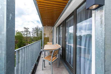Deichhäuser Anna Küste Deichhäuser Anna Küste 8-33 Bensersiel - Balkon mit Gartenmöbeln