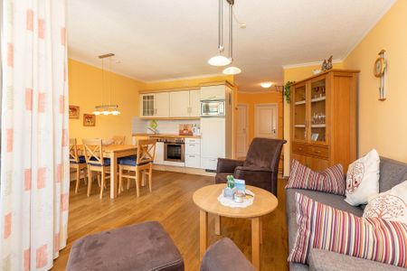 Apartmenthaus Atlantik Apartmenthaus Atlantik 205 Kühlungsborn - Wohn-Essbereich mit Couch
