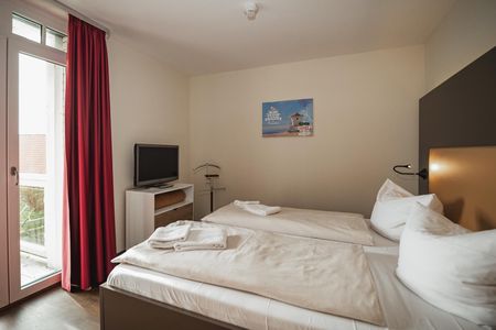 Resort Deichgraf Resort Deichgraf 27-07 Wremen - Schlafzimmer mit Doppelbett