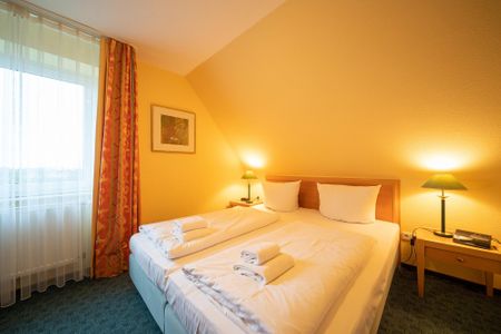 Hus Inselkieker Hus Inselkieker 216 Schillig - Schlafzimmer mit Doppelbett