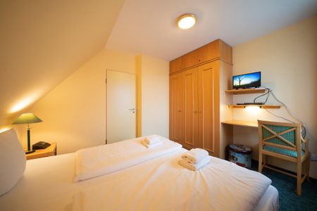 Hus Inselkieker Hus Inselkieker 216 Schillig - Schlafzimmer mit Kleiderschrank