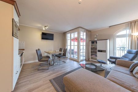 Apartmenthaus Atlantik Apartmenthaus Atlantik 117 Kühlungsborn - Wohn-Essbereich mit Couch